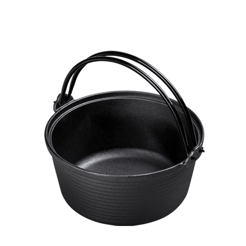 Cast iron dutch oven with vegetable oil coating and wooden lid