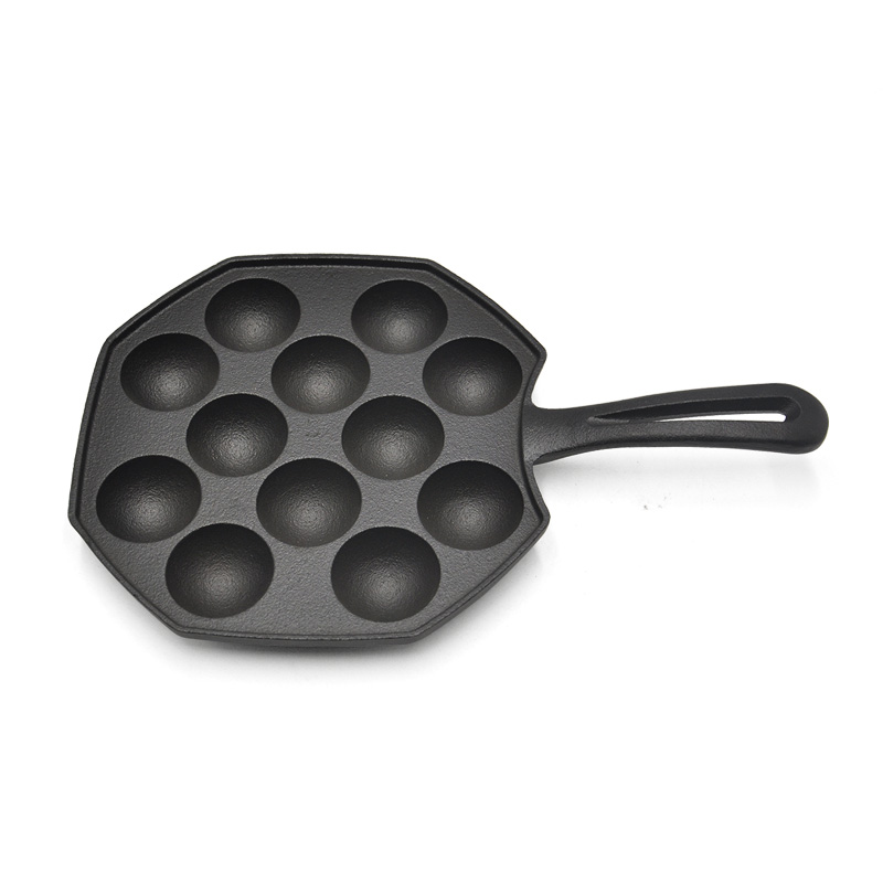 Cast iron fry pan with holes