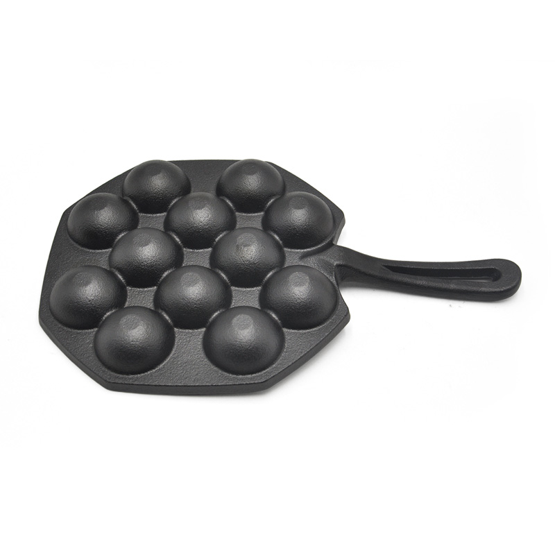 Cast iron fry pan with holes