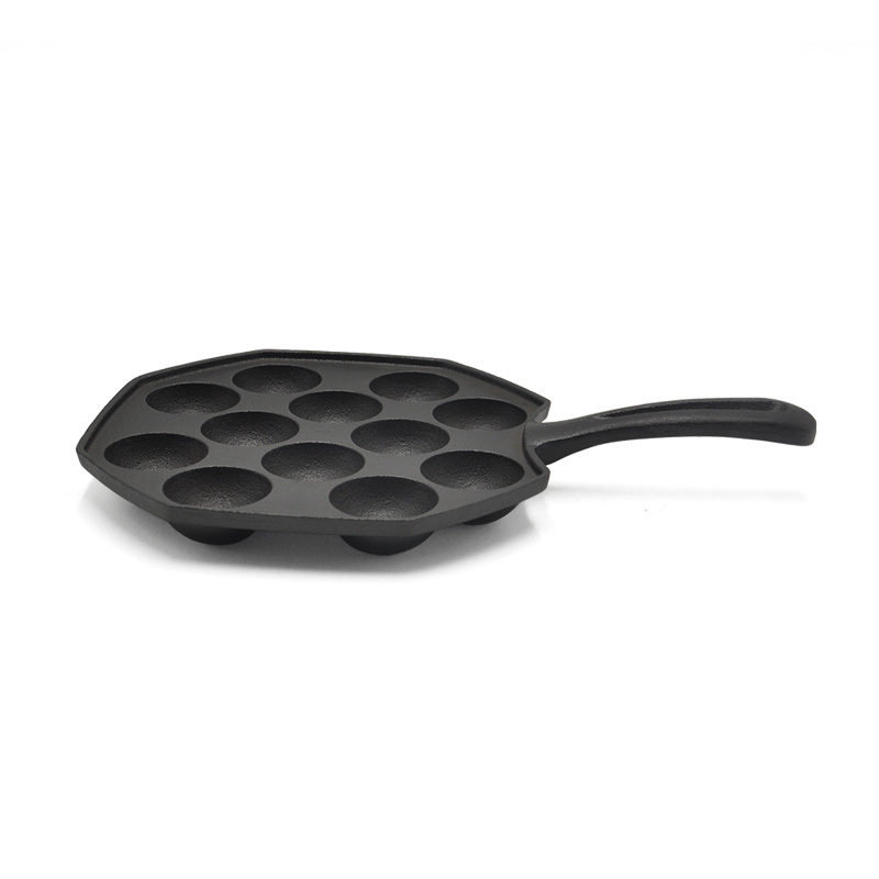 Cast iron fry pan with holes