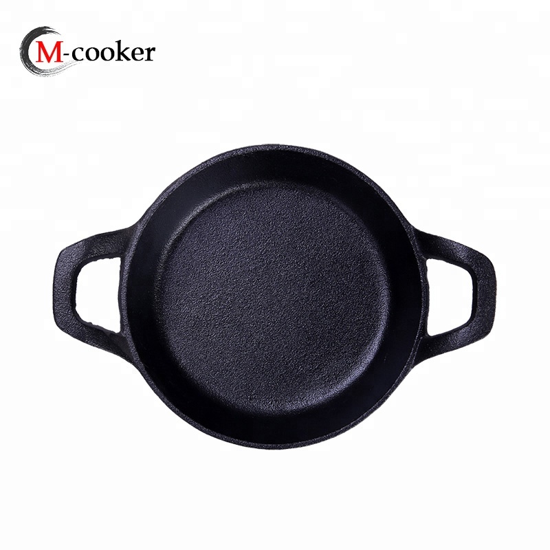 Small cast iron pizza pan with raised handle with pre-seasoned coating