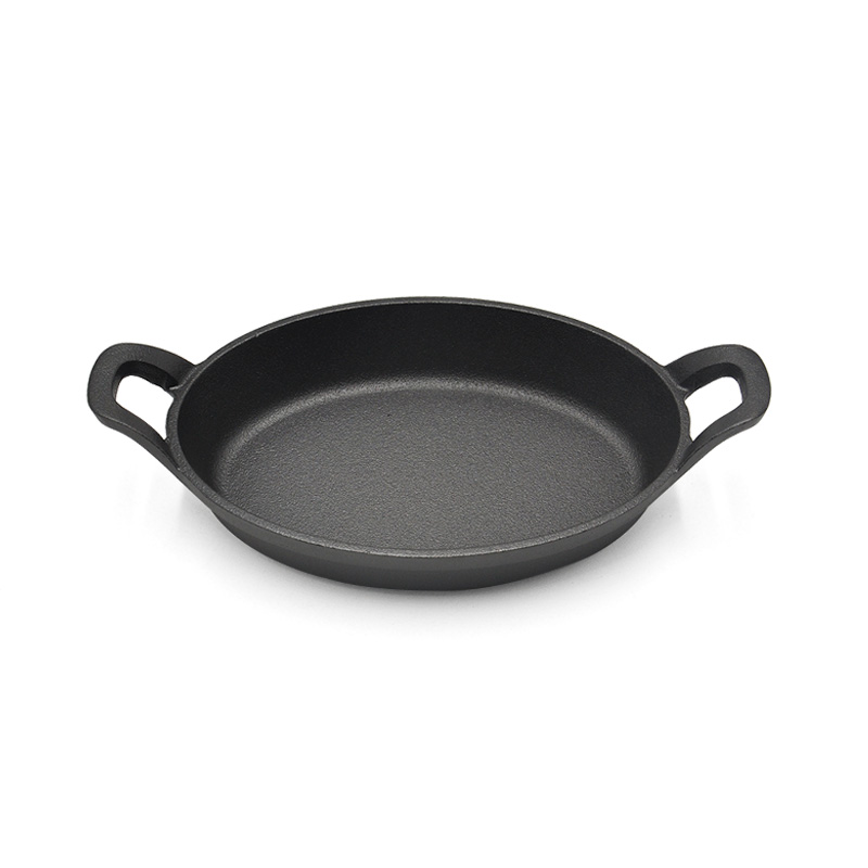 Oval cast iron sizzling plate with Integral handle