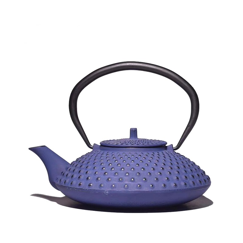 Monolithic casting iron teapot with flat bottom